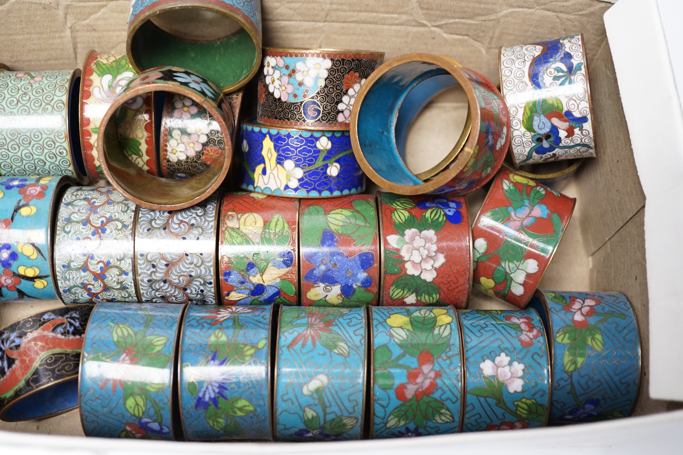 Twenty-eight Chinese cloisonné enamel napkin rings